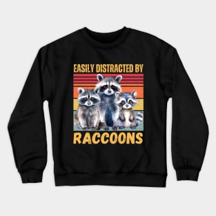 easily distracted by raccoons Crewneck Sweatshirt